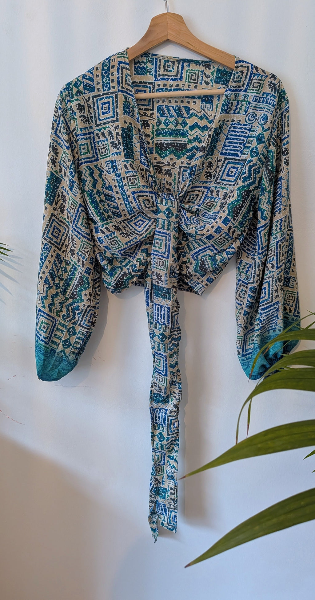 Wrap blouse with bishop sleeves